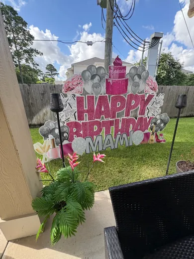 Festive yard greeting showing a personalized celebration message